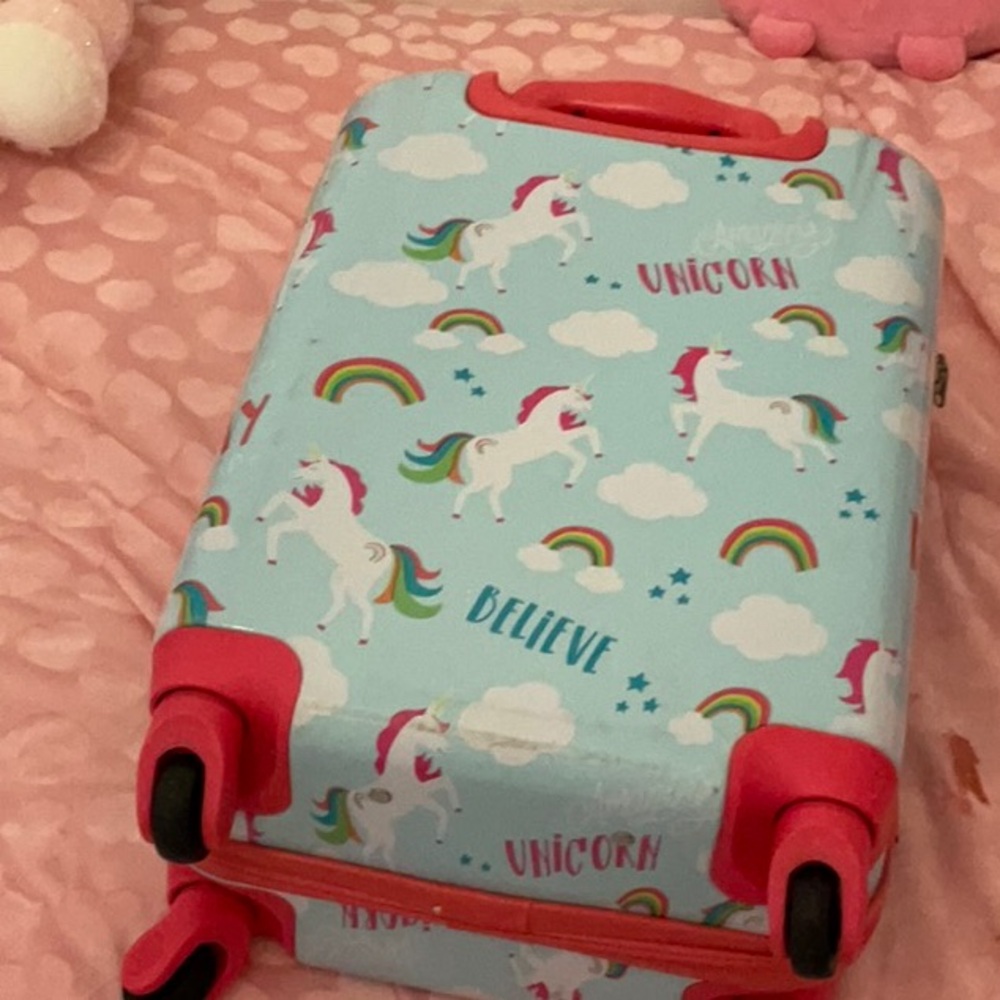 A light blue suit case for kids